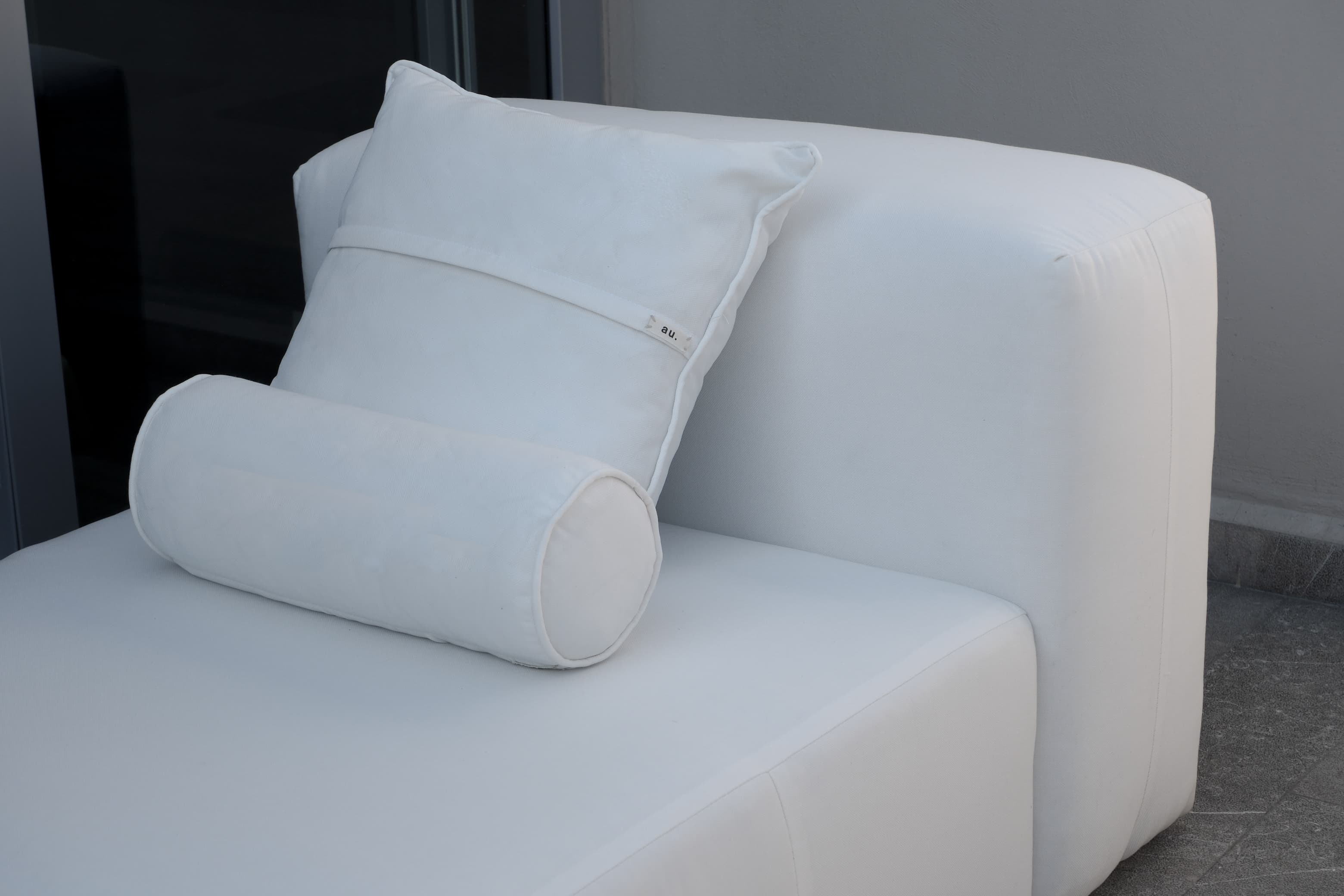 Cojín blanco detalle